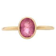 Size: 6 3/4 Sizing Fee: Up 1 size for $40 or Down 1 size for $40 Brand: Nina Wynn Metal Content: 18k Yellow Gold Stone Information Natural Pink Tourmaline Carat(s): .90ct Cut: Oval Total Carats: .90ct Style: Solitaire Features: Textured Finishes Measurements Face Height (north to south): 11/32" (8.2mm) Rise Above Finger: 7/32" (4.8mm) Weight: 2.3 Grams Stamps: 750, maker's mark Condition: New without Tags Timeless 14k Stamped Oval Sapphire Ring, Timeless Oval Sapphire Ring Stamped 14k, Elegant Untreated Oval Emerald Ring, Timeless Oval Yellow Gold Ruby Ring, Classic Oval Tourmaline Emerald Ring, Timeless Oval Ruby Ring In Yellow Gold, Gold Oval Pink Sapphire Rings, Oval Ruby Ring In Yellow Gold Timeless Style, Timeless Oval Ruby Ring