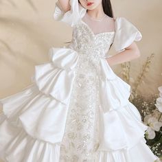 Size
			Bust
			Length
			Waist
		
		
			cm
			inch
			cm
			inch
			cm
			inch
		
		
			2-3 Years (100cm)
			56
			22.05 

			78
			30.71 

			53
			20.87 

		
		
			3-4 Years (110cm)
			60
			23.62 

			88
			34.65 

			56
			22.05 

		
		
			4-5 Years (120cm)
			64
			25.20 

			97
			38.19 

			59
			23.23 

		
		
			5-6 Years (130cm)
			68
			26.77 

			108
			42.52 

			62
			24.41 

		
		
			7-8 Years (140cm)
			72
			28.35 

			117
			46.06 

			65
			25.59 

		
		
			8-9 Years (150cm) Organza Dress With Bow For Dress-up Occasions, White Princess Dress For Banquet, Princess Style White Banquet Dress, White Princess Gown For Banquets, White Ribbon Dress For Dress-up, White Dress With Ribbon For Dress-up, White Party Dress With Ribbon, Fitted Dress With Bow For Confirmation, White Ruffled Ball Gown For Dress-up