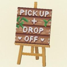 a wooden sign with the words pick up and drop off written on it in white