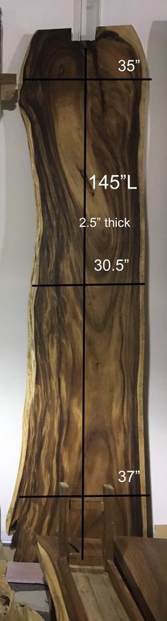 a wooden bench with measurements on it