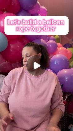 a woman sitting in front of balloons with the caption let's build a balloon rope together