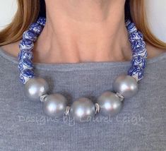 Blue & White Chinoiserie Silver Pearl Necklace This fabulous one of a kind chinoiserie necklace is a Designs by Laurel Leigh hand beaded original design. It is made with chunky hand painted blue and white porcelain beads and huge silver Japanese cotton pearls. Necklace is strung on wire and is approximately 20-21” with a nice silver plated toggle clasp. * One of a kindPlease note that any pearl, glass, gemstone or wooden beads used are natural materials and the vintage porcelain beads I use are Blue And White Chinoiserie, Porcelain Beads, Chunky Statement Necklace, Silver Pearl Necklace, Silver Necklace Statement, Blue And White Porcelain, Japanese Cotton, Focal Bead, Toggle Clasp