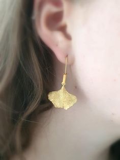 Silver earrings in the shape of ginkgo leaves, here in a gold-plated version. Earrings length 4.5 cm, width 2.6 cm. 925 silver fineness. Delightful, full of shine and irresistible charm. Ginkgo Earrings, Ginkgo Leaves, Ginkgo Leaf, Gold Gold, Jewelry Earrings Dangle, Poland, Gold Earrings, Silver Earrings, 925 Silver