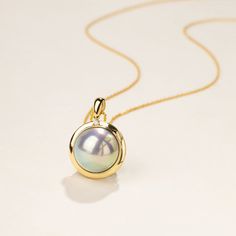 Material: 18K gold, and Mabe Pearl Mabe Pearl saltwater cultured pearl Size of pearl: 12.0-13.0 mm Handpicked of every pearl, only the top 1% of pearls are selected Handcrafted Lifetime warranty The price of this product is only the pendant price, and a 45cm adjustable 925 silver chain is given as a gift. Luxury Yellow Gold Baroque Pearl Necklace, Luxury High Luster Akoya Pearl Necklace, Round Pearl Pendant Jewelry From Mother Of Pearl, Round Mother Of Pearl Pendant Jewelry, Formal Yellow Gold Pearl Necklace With High Luster, Yellow Gold Pearl Necklace For Formal Occasions, Formal Tahitian Pearl Necklace In Yellow Gold, Formal Yellow Gold High Luster Pearl Necklace, Formal High Luster Pearl Pendant Necklace