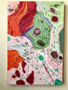 an abstract painting on a white wall with red, green and orange colors in it