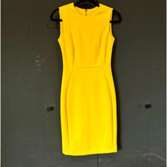 Calvin Klein Yellow Bodycon Knee Length Dress - Size 2 - Never Worn - No Rips Or Stains Chic Knee-length Yellow Midi Dress, Yellow Knee-length Office Dress, Chic Yellow Knee-length Sleeveless Dress, Yellow Knee-length Midi Dress For Daywear, Yellow Calvin Klein Dress, Calvin Klein Black Dress, Gold And Black Dress, Boho Denim, Royal Blue Dress