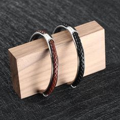 Add a little fashion to your wrist with the Lupo Braided Leather & Stainless Steel Cuff Bracelet This fashionable cuff bracelet mixes the softest braided leather and polished to perfection scratch-resistant stainless steel for an easy way to make even the most formal outfits pop just in seconds. Material: Stainless Steel, Leather Dimensions: Hand Fit: 7.1-8.3 in / 18-21cm (fits 99% of male hands) Bracelet Diameter: 2.44 in / 6.2 cm Bracelet Width: 0.24 in / 0.6 cm Classic Brown Bangle Bracelets, Elegant Braided Leather Bracelets, Formal Adjustable Braided Bracelet, Formal Adjustable Braided Bracelets, Leather Bangle Bracelet, Elegant Brown Leather Bracelet With Stainless Steel Clasp, Elegant Brown Leather Braided Bracelet, Formal Adjustable Bracelet With Wrist Strap, Elegant Brown Leather Braided Bracelets