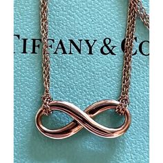 Authentic~New Never Worn. Might Have Light Hairline Scratches From The Storage And Handling. Tiffany & Co. Double Chain Infinity Necklace. Tag Stamped “Tiffany & Co” “ Au750” Rose Gold 750 On 16” Chain Infinity Charm Size: 7/8” Wide. Will Come With A Box *Please Preview All Photos As Extended Description. Will Make A Perfect Gift Or A Great Addition To A Jewelry Collection. Infinity Charm, Infinity Necklace, Double Chain, Tiffany & Co., A Box, Womens Jewelry Necklace, Jewelry Collection, Jewelry Necklaces, Size 7