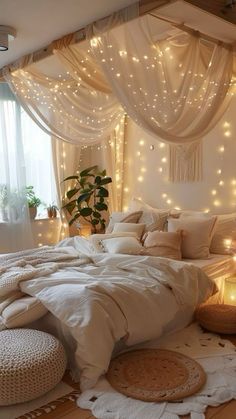 a bedroom with lights on the ceiling and bed in front of a white curtained window