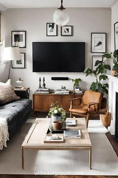 a living room filled with furniture and a flat screen tv mounted on the wall above a fire place