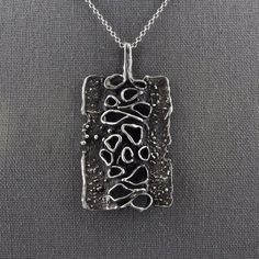 Vintage Abstract Mid 20th Century Modernist Brutalist Style Oxidized Pewter Pendant Silver Brutalist Jewelry With Oxidized Finish, Oxidized Silver Rectangular Jewelry, Silver Rectangular Jewelry With Oxidized Finish, Irregular Shapes, Pewter Pendant, Curling Ribbon, Smooth Edges, Pendant Design, Screw Back Earrings