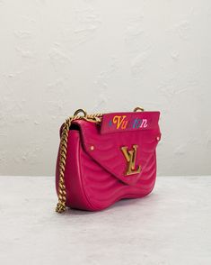 Pink calfskin leather with gold tone hardware with suede lining.  Made in France.  Flap top with push lock closure.  One main compartment.  Interior slip pocket.  Top handle with multi-color embroidered logo script, Gold-tone chain link shoulder strap.  Circa 2018.  Measures approx 10" W x 5.5" H x 3" D, Top handle with a 2" drop, Adjustable shoulder strap measures approx 21".  .  Good.  Light wear throughout.  Signs of use throughout.  Light rubs on corners.  Light scratches on hardware.  Light Pink Crossbody Shoulder Bag With Metal Logo, Pink Rectangular Bag With Metal Logo, Luxury Pink Bag With Metal Logo, Designer Pink Bag With Metal Logo, Luxury Pink Bags With Metal Logo, Designer Flap Bag With Branded Hardware, Luxury Everyday Flap Bag With Metal Logo, Luxury Everyday Use Flap Bag With Metal Logo, Luxury Leather Flap Bag With Metal Logo