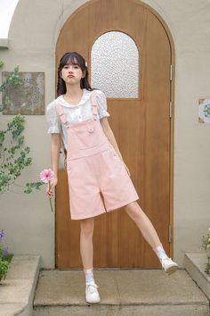 Extra sweet pink overalls with heart buttons, now in a shorter length for warmer days. Features a high waist boyfriend fit with roomy legs, side pockets and back pockets. S: 32" waist, 40" hips, 12" rise, 25" thighs, 6" inseamM: 33.5" waist, 41.5" hips, 12" rise, 26" thighs, 6" inseamL: 35" waist, 43" hips, 12" rise, 27" thighs, 6" inseam How to attach buckles:Slide the rectangular buckle on first, followed by the T-shaped buckle. Overall straps will hold on its own as such or you can slide the free end back into the rectangular buckle. Pink Overall Shorts, Peach Clothes Aesthetic, Cute Pink Bottoms With Pockets, Spring Bottoms With Side Pockets And Bib Front, Pink Shortalls For Summer, Cute Spring Shortalls With Bib Front, Cute Spring Shortalls Overall, Cute Spring Shortalls Overalls, Cute Spring Overall Shortalls