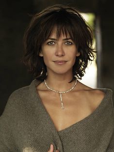 Actress Sophie Marceau poses at a portrait session in Paris on September 12, 2009. Sophia Marceau, Shag Hairstyle, Top Hairstyles, Portrait Session, 가을 패션, Hair Today, Great Hair, Hair Dos, Hairstyles With Bangs