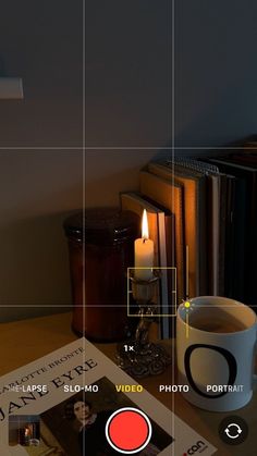 a coffee cup sitting on top of a wooden table