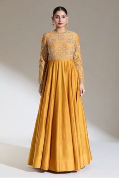 Mango yellow longline anarkali with floral embroidery using zardozi, sequins and cutdana. - Aza Fashions Gold Zari Work Long Sleeve Gown, Gold Long Sleeve Gown With Zari Work, Gold Long Sleeve Raw Silk Dress, Gold Embroidered Raw Silk Gown, Gold Floor-length Salwar Kameez With Dori Work, Gold Anarkali Set With Intricate Embroidery And Long Sleeve, Gold Anarkali Gown With Long Sleeves, Gold Churidar With Dabka Work For Reception, Gold Gown With Dabka For Eid