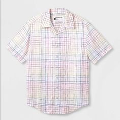 This Pride Adult Short-Sleeve Woven Rainbow Grid Button-Down Shirt Is Perfect For Showing Your Love For The Lgbtqia+ Community. This Casual-Fit Button-Down Shirt Is Made From A Lightweight And Breathable Fabric To Help You Breeze Through Your Day In Cool Comfort, And It Features A Classic Collared Design With A Button-Down Front For Easy Layering And Versatile Styling. In A White Hue, This Short-Sleeve Button-Down Shirt Features A Multicolored Woven Grid-Like Print In A Vibrant Rainbow Color Pal Classic Multicolor Short Sleeve Shirt, Casual Multicolor Shirt With Spread Collar, Casual Multicolor Button-up Short Sleeve Shirt, Casual Multicolor Tops With Spread Collar, Casual Multicolor Short Sleeve Shirt With Button Closure, Pink Cotton Button-up Short Sleeve Shirt, Woven Rainbow, Rainbow Color Palette, Rainbow Color