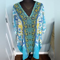 Nwot Women’s Summer V-Neck Coverup One-Size Perfect Condition! No Flaws! Perfect For The Beach Or Pool. Oversized And Light! Gem Detail On The Front. Split On Sides Please Let Me Know If You Have Any Questions. Same-Day Shipping. Light Blue V-neck Top For Vacation, Light Blue V-neck Top For Beach Season, Blue V-neck Top For Beach, Blue V-neck Beach Tops, Blue V-neck Tops For The Beach, Blue V-neck Top For Beach Cover-up, Stretch V-neck Top For Beach Cover-up, Blue V-neck Top For Vacation, Casual Blue Top For Beach Cover-up