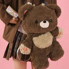 Gaint Brown Bear Backpack 🎒🐻🌸💖✨ Get ready for a new level of cuteness and functionality with the Giant Brown Bear Backpack. This adorable backpack is designed to accompany you on all your adventures, showcasing your love for kawaii sweetness. With its charming brown bear design and spacious interior, this backpack is both practical and eye-catching. The giant brown bear adds a playful and lovable touch, instantly capturing the hearts of those around you. Its generous capacity allows you to carry all your essentials, from books and laptops to travel essentials and more. Crafted with attention to detail and high-quality materials, the Giant Brown Bear Backpack is built to withstand the demands of your busy lifestyle. The adjustable straps ensure a comfortable fit, while the durable const Bear Accessories, Bear Backpack, Kawaii Store, Cute Mini Backpacks, Cute Squishies, Bear Theme, Plush Backpack, Kawaii Plushies, Cute Backpacks