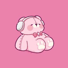 a pink teddy bear with headphones on its ears sitting in front of a pink background