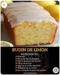 there is a cake with icing and lemons on it