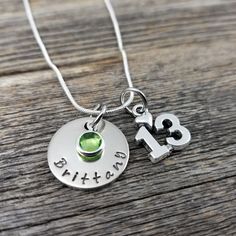 "13th Birthday Necklace, Gift for Girl Turning 13, Personalized Name Necklace with Birthstone, Gift for 13 Year Old, Little Girl Gift, Thirteen birthday Available in 16\", 18\" or 20\" necklace length. For other year necklaces click below: 10th - https://www.etsy.com/listing/849510629/10th-birthday-necklace-gift-for-girl 11th - https://www.etsy.com/listing/835614640/11th-birthday-necklace-gift-for-girl 12th - https://www.etsy.com/listing/849513451/12th-birthday-necklace-gift-for-girl 13th - http Silver Necklace For May Birthstone Birthday, Silver Necklace With May Birthstone For Birthday, Silver Necklace With May Birthstone, Silver Necklace For Birthday With May Birthstone, Silver Birthday Necklaces With May Birthstone, May Birthstone Charm Necklace For Birthday, Nickel Free Birthstone Necklace For Birthday And Mother's Day, Silver Adjustable Charm Necklace For Birthday, Adjustable Silver Charm Necklace For Birthday