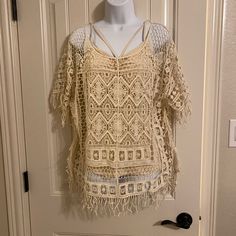 Crochet Fringe Poncho Pure White Beige Open Knit Cover-up, Beige Crochet Top For Fall Vacation, Bohemian Cream Tops For Beach, Beige Open Knit Cover-up For Spring, Spring Open Knit One-size Cover-up, Spring Open Knit Cover-up In One Size, Bohemian Beige Open Knit Cover-up, Chic Summer Poncho One Size, Casual Summer Poncho With Fringe