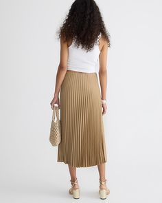 Our newest pleated midi, this sweet and classic style is made from a satiny material that's lightweight with a touch of sheen. We sewed a stretchy waistband and additional pleats into this skirt so it's superswishy - definitely one to twirl around in. Skirt For Women, Slip Skirt, Classic Style, Midi Skirt, J Crew, Womens Skirt, Cashmere, Skirt, For Women