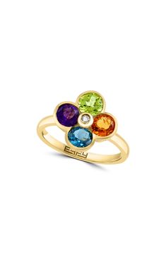 Show off dazzling sparkle in this 14-karat yellow-gold flower ring featuring semiprecious stone petals centered by a dainty bezel-set diamond. 1/2" diameter setting Total diamond weight: 0.02ct. Color: H–I Clarity: I1–I2 14k gold/citrine, London blue topaz, amethyst and/or peridot/diamond Made in the USA Diamond Guide 14k Yellow Gold Diamond Ring With Gemstone Accents, 14k Yellow Gold Flower Ring With Birthstone, Yellow Gold Flower Ring With Birthstone In 14k Gold, Yellow Gold Flower Ring With Birthstone, Elegant Flower Shaped Birthstone Ring With Gemstone, 14k Gold Flower Shaped Gemstone Rings, Fine Jewelry Yellow Gold Flower Ring With Center Stone, Yellow Gold Diamond Flower Ring With Gemstone, Yellow Gold Gemstone Flower Ring With Round Cut