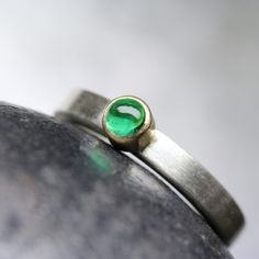 Modern Colombian Emerald Engagement Ring Solid Silver 18K Yellow Gold Minimalistic Green Cabochon - Beryl Dome by NangijalaJewelry on Etsy Modern Emerald Jewelry In Yellow Gold, Modern Everyday Rings With Bezel Setting, Modern Yellow Gold Emerald Jewelry, Modern Oval Green Jewelry, Modern Emerald Gemstone Ring For Wedding, Modern Emerald Ring For Wedding, Modern Wedding Emerald Ring With Gemstone, Modern Polished Emerald Jewelry, Modern Green Emerald Jewelry