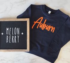 The Auburn Puff Vinyl Tee or Sweatshirt is the perfect way to show your Auburn school spirit! This vibrant, vinyl design will have you cheering for the Tigers in style. War Eagle! Auburn Sweatshirt, Auburn Shirts, Puff Vinyl, Back To School Kids, Vinyl Shirts, Sweatshirt Short Sleeve, Fall Kids, Green Pants, Halloween Tees