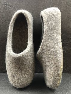 If You prefer wearing organic woolen clogs, then natural gray wool felted man slippers are Your choice.    These handmade organic woolen clogs with latex soles are needed home shoes to your dear person or to yourself without any special occasion just to warm feet and make Your stay warm and comfortable at home.  Wool indoor slippers felt clogs are comfy, cozy, warm, flexible, lightweight. They are recommended to wear all the year round, because wool warms the feet in cold season and cools in hot Man Slippers, Felted Wool Slippers, Men Slippers, Knit Projects, Indoor Slippers, Felt Wool, Wool Slippers, Shoe Inspo, Natural Latex