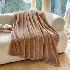 A fleece blanket that is khaki is draped over a white fuzzy couch - Fleece Chic Blankets For Winter, Cozy Luxury, Throw Blanket Gift, Black Blanket, Baby Throw, Black Flannel, Blanket For Couch, Summer Blanket, Bed Throw