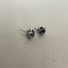 These Gothic studs are crafted with black cubic zirconia stones and made of stainless steel. With a timeless gothic design, these studs are perfect for everyday wear to give your look a subtle edge. Sold as pair Material : 316 Stainless steel Set with Black Cubic Zirconia Size: 9mm Post: 22G / standard piercing Closure: Butterfly push back Ships in a gift box Listing for gothic studs only Gothic Design, Gothic Earrings, Cz Stud Earrings, Studs Earrings, Cz Earrings, Men Earrings, Black Earrings, Gothic Jewelry, Simple Earrings