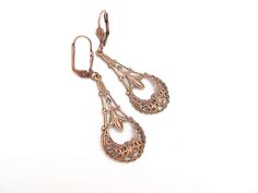 "Beautiful Art Nouveau Design Dangle Earrings. Antiqued Copper Filigree. Ornate, pretty, comfortable to wear. Measure 1-7/8\" top of ear wire to bottom. Nickel Free. Now available in Antiqued Silver Plated: https://www.etsy.com/listing/473757194 Handmade by me, on Maui, and sent to you with Aloha! 40 Storefront and Sections: hawaiibeads.etsy.com" Antique Filigree Chandelier Earrings For Wedding, Bohemian Drop Jewelry For Wedding, Teardrop Brass Chandelier Earrings For Wedding, Brass Teardrop Chandelier Earrings For Wedding, Bohemian Pierced Chandelier Earrings For Wedding, Elegant Copper Earrings For Wedding, Wedding Bronze Filigree Earrings, Antique Chandelier Earrings For Wedding, Elegant Copper Teardrop Earrings