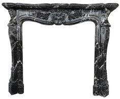 a black and white marble fireplace surround