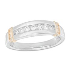 Promise to love, honor and cherish him with this stunning diamond wedding band. Created in 10K two-toned gold, this design showcases a row of graduated-size channel-set diamonds - the largest the 1/20 ct. center stone. Shimmering diamond-lined collars in yellow gold lend eye-catching contrast to the white gold shank. Radiant with 3/8 ct. t.w. of diamonds and a bright polished shine, this wedding band shimmers with your affection. Channel Set Wedding Band, Diamond Wedding Band, Channel Set, Size 10 Rings, Showcase Design, Diamond Stone, Diamond Clarity, Diamond Wedding Bands, Diamond Wedding