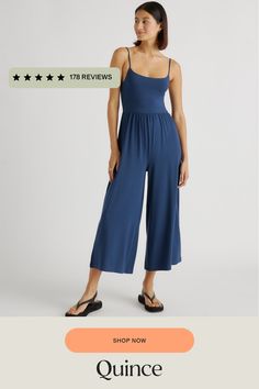 This one-piece has unlimited potential. Wide-leg style with carefree vibes, and cami top with gathered waistband for a flattering silhouette. Made from tencel jersey with a bit of stretch for extra comfort.  | Quince | Women's Tencel Jersey Wide Leg Jumpsuit in Navy, Size Large Casual Sleeveless Jumpsuits And Rompers With Elastic Back, Casual Sleeveless Jumpsuit With Elastic Back, Comfortable Beach Jumpsuits And Rompers For Summer, Comfortable Summer Beach Jumpsuits And Rompers, Solid Jumpsuits And Rompers For Summer Lounging, Solid Color Jumpsuits And Rompers For Summer Lounging, Relaxed Summer Jumpsuits And Rompers For Lounging, Seamless Summer Jumpsuits And Rompers, Casual Sleeveless Elastane Jumpsuits And Rompers