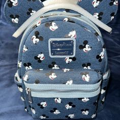 Brand New With Tags And Original Paper Stuffing Still Inside Original Foam Ear Protector Mickey Mouse Denim Print Disney Parks Exclusive Front Zipper Pouch Red Mickey Mouse Print Inside Smoke Free, Pet Friendly Home Casual Minnie Mouse Backpack For Disney Trips, Casual Minnie Mouse Backpack For Travel, Casual Mickey Mouse Backpack For Back To School, Casual Minnie Mouse Bag For Back To School, Casual Minnie Mouse Backpack, Casual Minnie Mouse Back To School Bag, Casual Minnie Mouse Standard Backpack, Casual Mickey Mouse Backpack, Casual Mickey Mouse Backpack For Travel