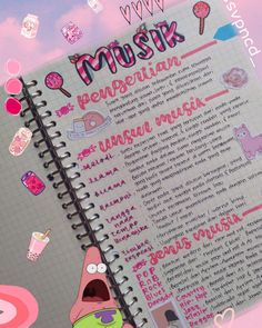 an open notebook with stickers on it and the words mush written in pink