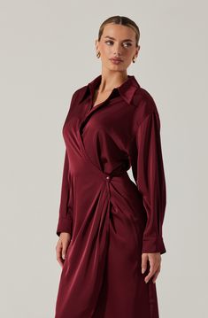 Satin wrap midi shirt dress Perfect for work to wherever Button and tie closure along wrap detail Dry clean only 100% Polyester Style #ACDR102477 Formal Button-up Midi Dress With Tie Waist, Chic Long Sleeve Wrap Dress For Work, Elegant Tie Waist Shirt Dress For Work, Elegant Long Sleeve Wrap Dress For Work, Formal Long Sleeve Midi Dress With Tie Waist, Elegant Shirt Dress With Tie Waist For Work, Elegant V-neck Shirt Dress For Semi-formal Events, Chic Long Sleeve Wrap Dress For Office, Elegant Button-up Midi Dress With Tie Waist