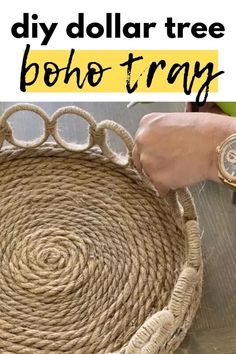 a person holding a rope basket with the words diy dollar tree boho tray