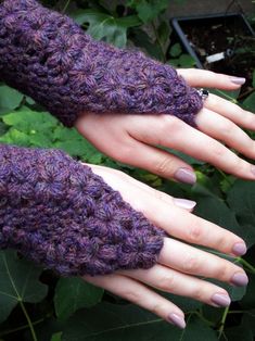 several photos of hands wearing purple knitted gloves