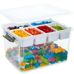 a plastic container filled with lots of colorful legos