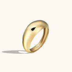 The Bold Dome Ring is modern, fashionable and feminine. An outstanding ring that enhances your style at all times. - Made in 14k Solid Gold- Bottom Width: 3.38 mm / 0.13 inches- Top Width: 8.02 mm / 0.31 inches- Thickness: 1.35 mm / 0.05 inches - This product comes with iconic Norm Jewels gift box Gold Dome Ring, Luxury Jewelry Brands, Bold Rings, Full Eternity Ring, Dome Ring, Evil Eye Ring, Linking Rings, Sparkling Rings, Gifts For My Wife