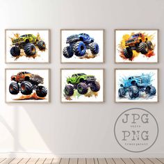 four monster trucks are hanging on the wall in a room with wood floors and white walls