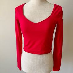 Beautiful Neck Line. Long Sleeve. Cropped Top. Measurements: Chest (Pit To Pit)- 14.5”; Length- 16” 95% Cotton; 5% Spandex. Machine Wash Cold Red Elastane Party Top, Red Fitted V-neck Crop Top, Red Elastane Tops For Spring, Red Stretch Top By Forever 21, Red Stretch Tops From Forever 21, Red Stretch Top From Forever 21, Forever 21 Trendy Red Crop Top, Fitted Red Forever 21 Top, Trendy Red Forever 21 Crop Top