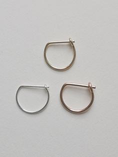 22 20 18  gauge D Hammered Septum Ring, Rose Gold Septum Ring. Also available 14K Gold Filled, Sterling Silver. D E S C R I P T I O N ☆Handmade. ☆Hammered. ☆D Septum Piercing Ring, 8mm, 9 mm, 10 mm. ☆Material: 14K rose gold , 14K gold filled, sterling silver, made in USA. ☆Only for an healed piercing.  G I F T S ☆Will be delivered in a  envelop. ☆If you would like to include your message for the recipient, please leave me your note in the note section at check out. P R O D U C T I O N - T I M E Small Hoop Rose Gold Rings For Anniversary, Hoop Rings In Rose Gold Sterling Silver, Minimalist Small Hoop Rose Gold Rings, Rose Gold Hoop Rings In Sterling Silver, Minimalist Rose Gold Small Hoop Ring, Small Hoop White Gold Rings For Gift, Minimalist Small Hoop Promise Rings, White Gold Small Hoop Rings As Gift, Healed Piercing