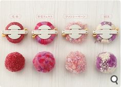 several different types of hair clips on a white surface with japanese characters in the background