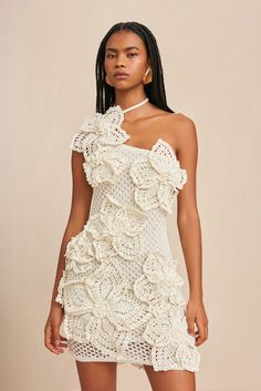 A hand-crocheted, mini-dress with large, three-dimensional knit floral motifs.- Ties behind the neck- Lined- Open knit- One shoulder Dirndl Outfit, Double Layer Dress, Bandeau Tops, Sleeveless Outfit, Mini Robes, Knitted Flowers, Fitted Mini Dress, Women Halter, Dresses 2024